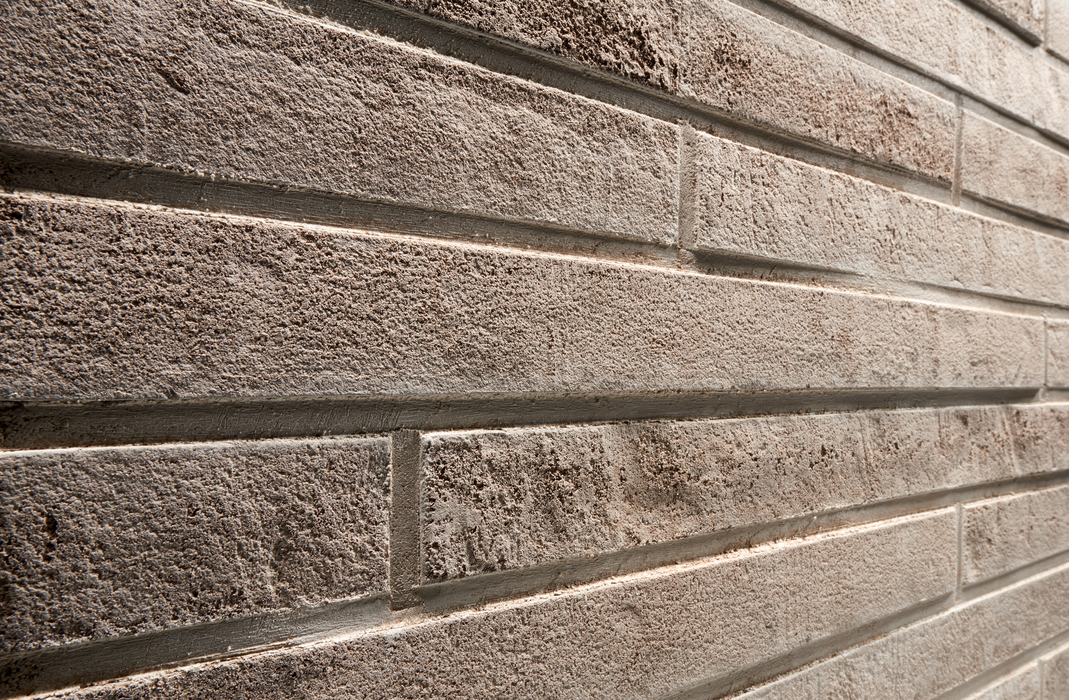 Клинкерная фасадная плитка под кирпич Stroeher (Штроер) Stilt 452 silber-grau рельефная, 490*40*14 ммreu