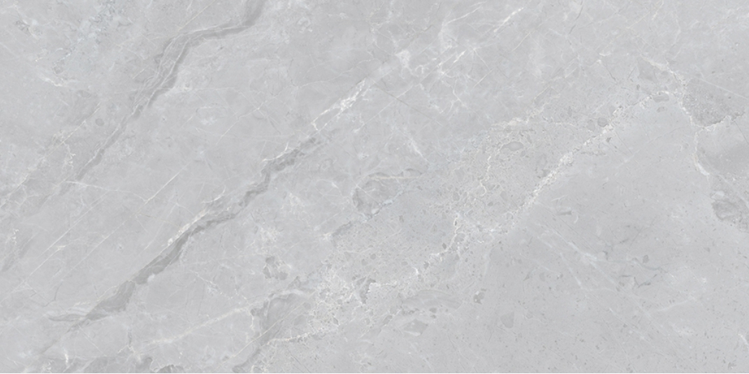 Polished Stone Henessy Light Grey (светло-серый камень с глянцевым эффектом и лёгким мраморным рисунком)— гибкий камень 1200×600 мм
