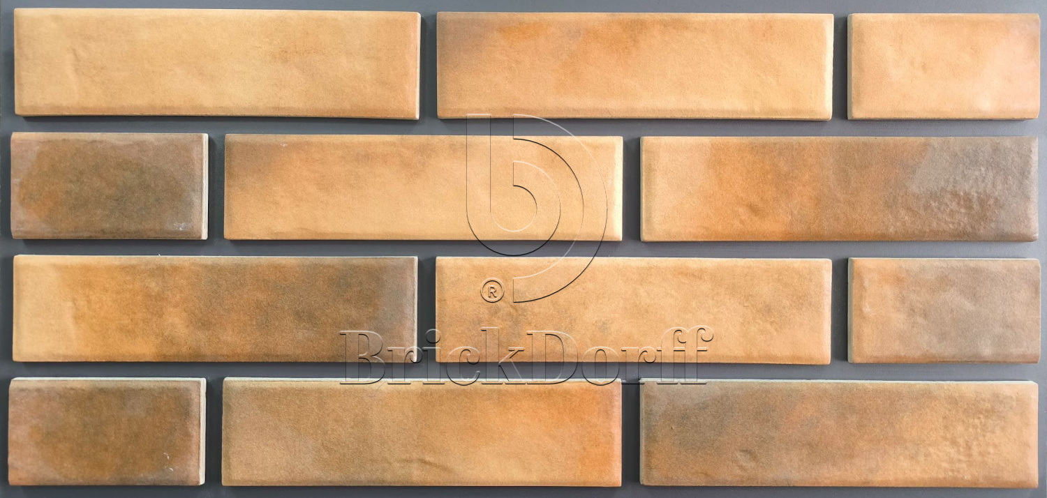 Фасад, отделанный плиткой под старый кирпич